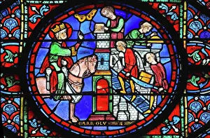 Stonemason: Charlemagne stained glass window, Chartres cathedral, France