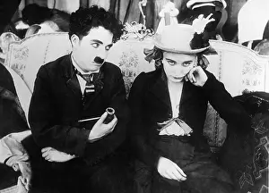 Edna: Charles Chaplin and Edna Purviance in Behind the Screen, 1