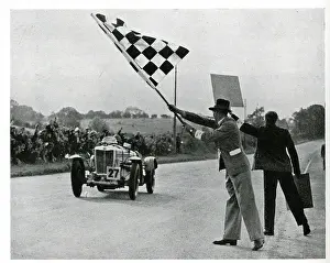 Finishing: Charley Dodson crossing the finishing line