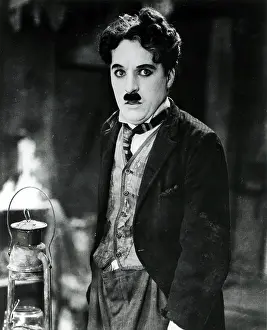 Charlie Chaplin as the little tramp