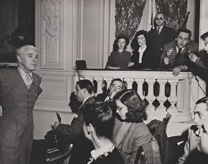 Scares: Charlie Chaplin during a press conference in the