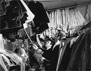 Furriers: CHECKING FUR COATS
