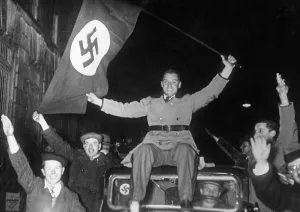 Jubilation: Cheering Austrians on their way to Vienna, 1938