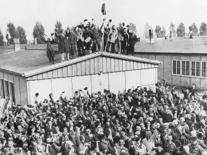 Announced: Cheering concentration camp prisoners after the liberation