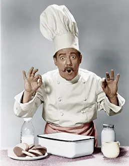 Toque: Chef in the kitchen saying OK