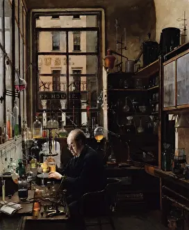 Workbench: Chemist Thomas Price engrossed in his work in