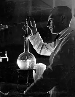 Chemists: Chemist at work in a laboratory
