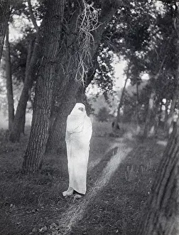 Robed: Cheyenne Waiting in Forest, 1910