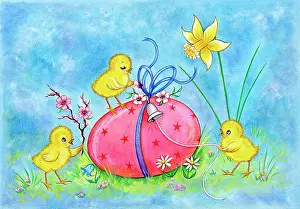 Unwrapping: Three chicks with Easter Egg
