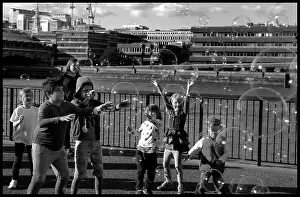 Bubbles: Chidren playing with bubbles London
