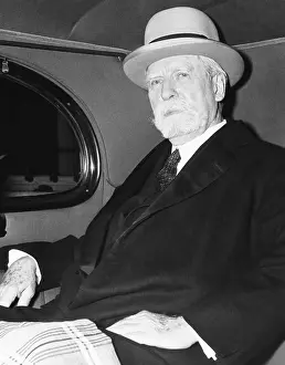 1211: Chief Justice Charles Evans Hughes leaving for