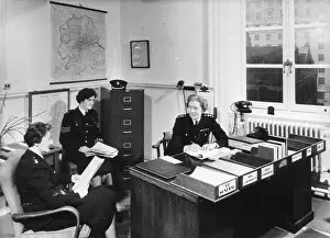 Epaulettes: Chief Superintendent Winifred Barker in her office