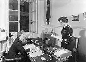 Epaulettes: Chief Superintendent Winifred Barker in her office