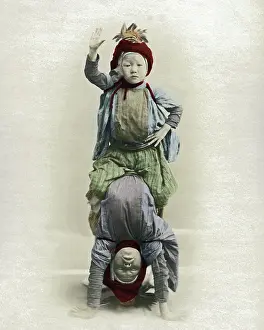 Acrobats: Two child acrobats, Japan