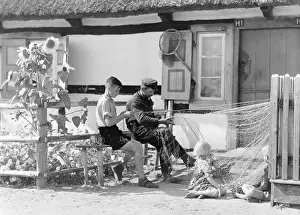Mending: Child labour, 1942