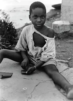 Seopedi: Child outside their home, Soweto, 1993