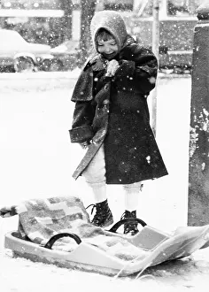 Imagno Brandstätter Images Gmbh: Child with a plastic bobsleigh in Vienna 1979