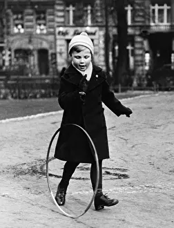 Tire: Child playing in Berlin, 1939