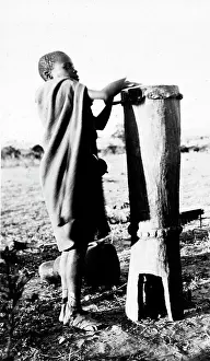 Ilam: Child playing the Nrandarikwa drum, Drum, Unknown