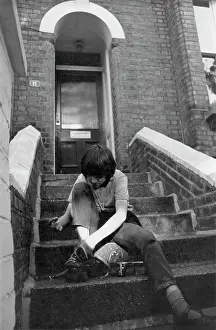 The John Krish Collection: Child putting on roller skates