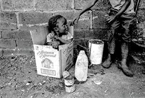 Shebeen: Child in a shebeen in Dobsonville