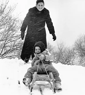 Sleds: Child on a sled 1988