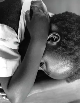 Seopedi: Child sleeping during break at Nonofelo Primary