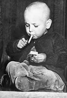 Underage: Child smoking a cigarette