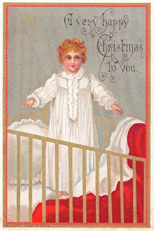 Cots: Child standing up in a cot on a Christmas card