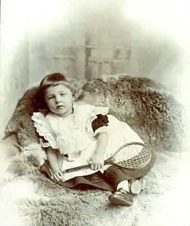 Toddlers: Child with tennis racket