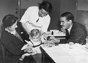 Vaccinated: CHILD BEING VACCINATED