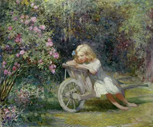 Billinghurst: Child in Wheelbarrow ' in a garden
