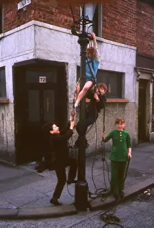 Sectarian: Children attaching rope to lamp post, Northern Ireland