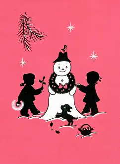 Snowmen: Two children building a snowman