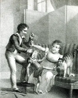 Punchinello: Children and cat playing with Mr Punch puppet