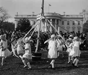 Bstp1215: Children dance around a maypole at the White House
