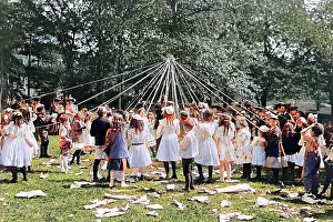 Maypole: Children dancing around a Maypole in Central Park in New Yor