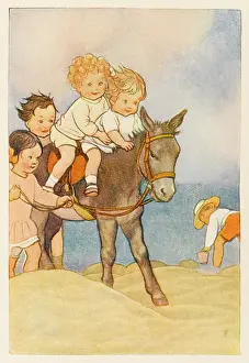 Sandcastle: CHILDREN ON DONKEY RIDE