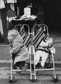 Pushchair: Two children in double push chair