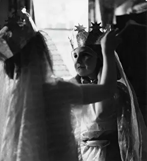 The John Krish Collection: Two children dressing up in crowns and veils