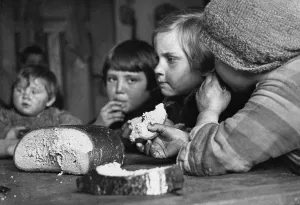 Supervised: Children eat bread, 1934