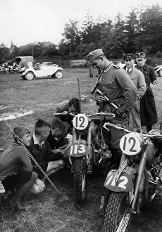 Grins: Children are fascinated by the motorcycles, undated