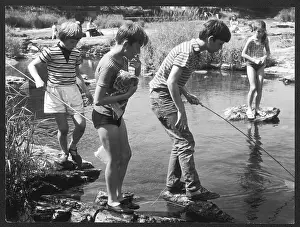 Deeper: CHILDREN FISH IN STREAM
