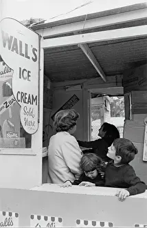 Lolly: Three children inside an ice cream kiosk