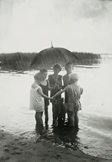 Lakefront: Children on the lakefront in the rain