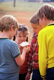 Illusions: Children look at Folded Paper Fortune Teller