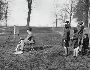 Parkway: Children look to a man while painting