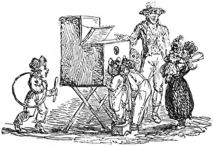 Jul17: Children looking into a peep box device