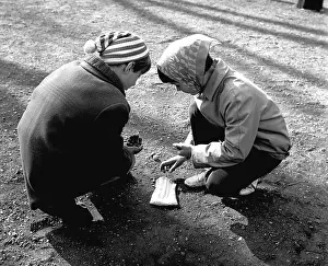 Begining: Children - marbles - play - game - Spring game