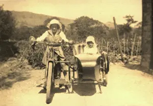 Motorbikes: Children in motorcycle and side car